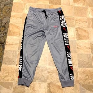 Gray Nike pants.